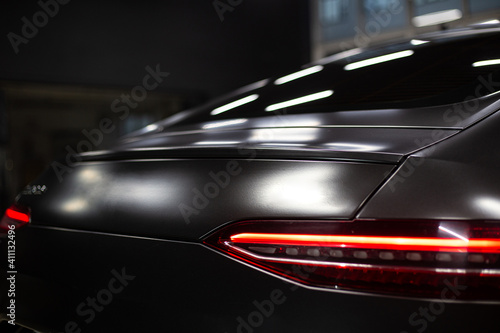 Car detailing series : Closeup black car lamp