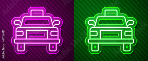 Glowing neon line Taxi car icon isolated on purple and green background. Vector.