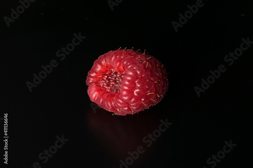 Ripe raspberry isolated on black background. Raspberry macro photography.  Raspberry photo part of my fruit photography collection.