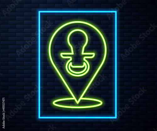 Glowing neon line Baby dummy pacifier icon isolated on brick wall background. Toy of a child. Vector.