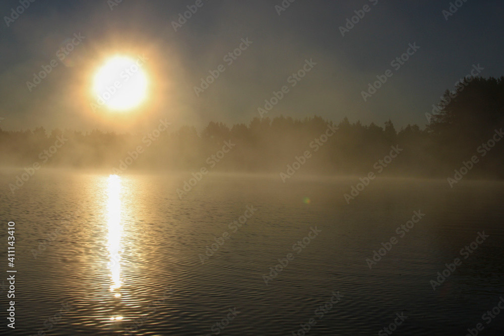 Sunrise on the lake fog