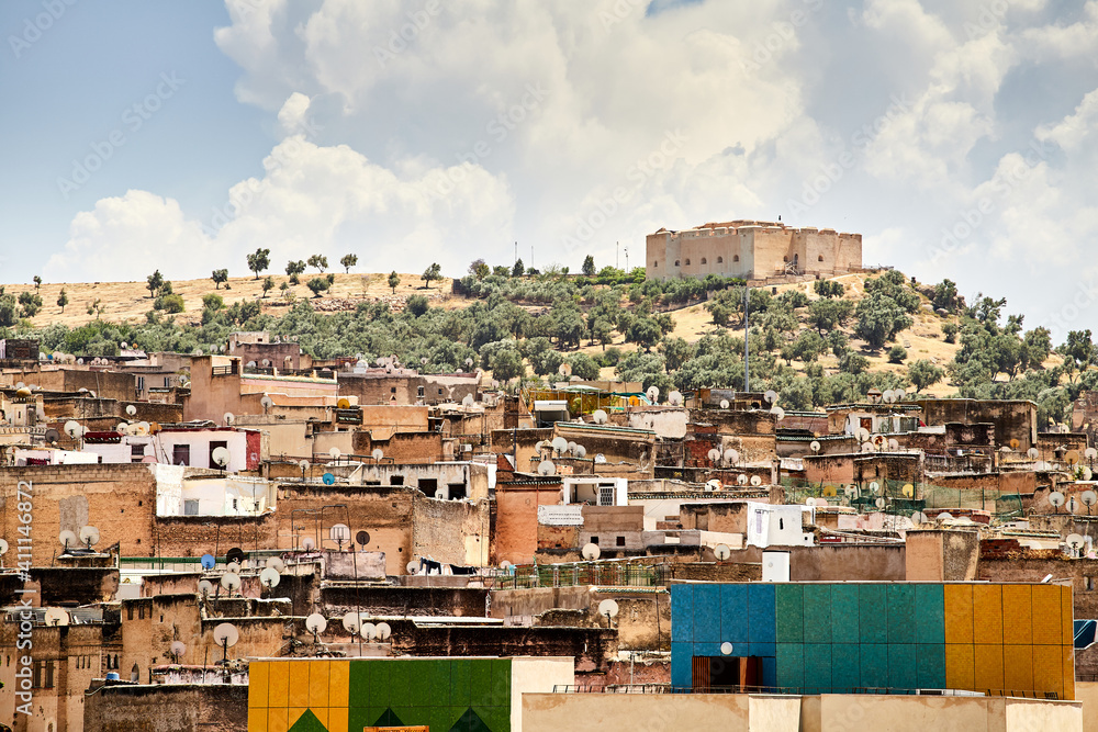 Panoramic view of the old town of Fez with the fort on the hilltop