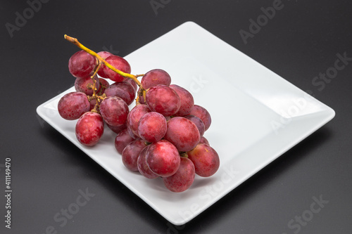 fresh grape whole bunch on a shadow background