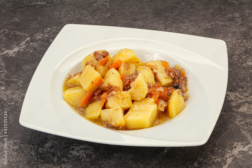 Roasted potato and beef with sauce Roasted potato and beef with sauce