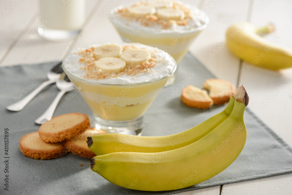 Ripe bananas, cookies for cream pudding. Beautiful and tasty dessert Ripe bananas, cookies for cream pudding. Beautiful and tasty dessert