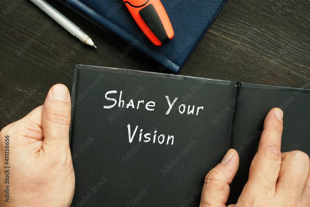 Lifestyle concept meaning Share Your Vision with phrase on the piece of paper.