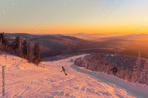 Sunset in winter. Evening on the ski track