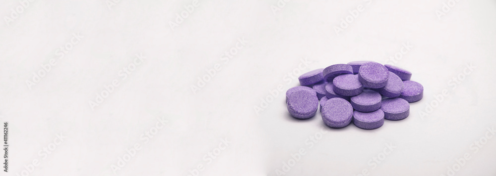 pills on a gray background. medicinal capsules on the table. treatment concept. many vitamins pills on a gray background. medicinal capsules on the table. treatment concept. many vitamins