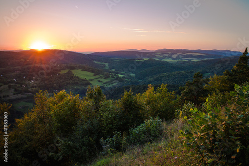 Sunset over hilly, rural countryside in Slovakia in summer