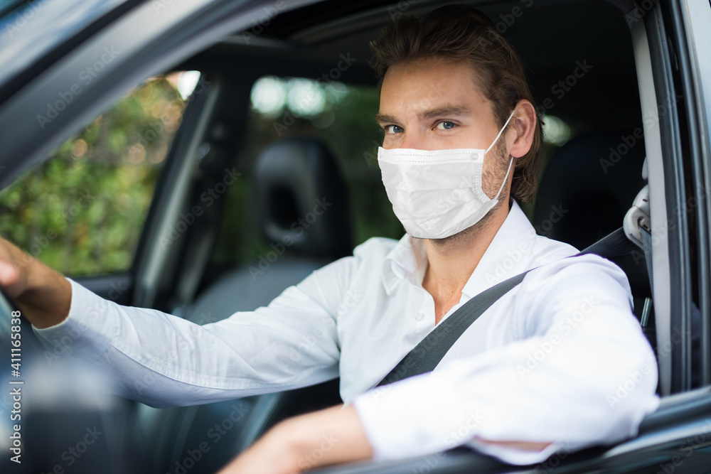 Businessman driving car, covid coronavirus concept Businessman driving car, covid coronavirus concept