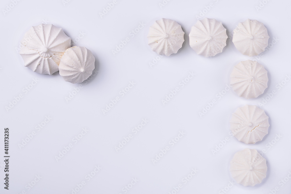 frame made of meringue cookies on white isolated background, frame made of meringue cookies on white isolated background,