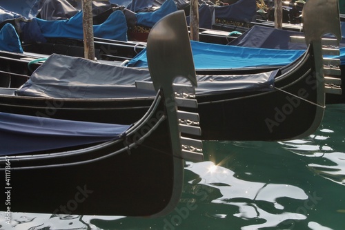 Venice, Italy - close up on a Gondola moored in the city centre 