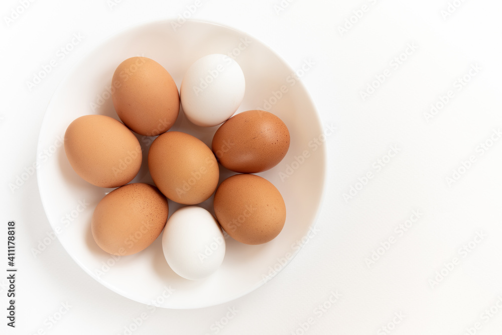 Group brown fresh eggs, isolated on white background. Group brown fresh eggs, isolated on white background.
