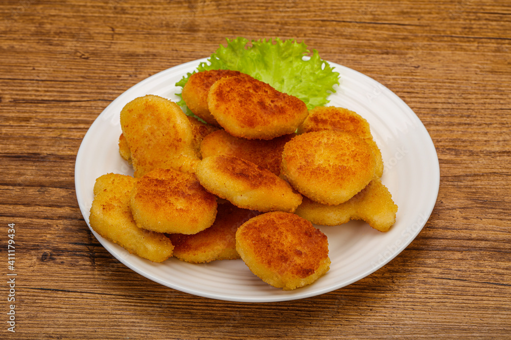 Fried chicken nuggets served salad leaves Fried chicken nuggets served salad leaves