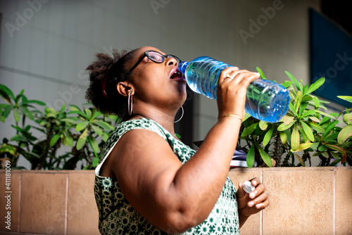 beautiful businesswoman drinking water.