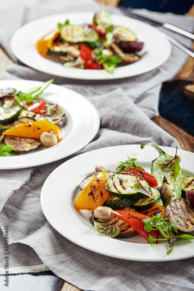 Grilled vegetables on a white plates. restaurant Grilled vegetables on a white plates. restaurant