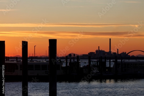 Venice, Italy: view on the lagoon and industrial skyline during sunset 