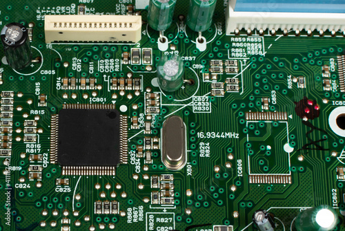 Fototapeta Naklejka Na Ścianę i Meble -  The motherboard of the device. The digital chip of the motherboard.