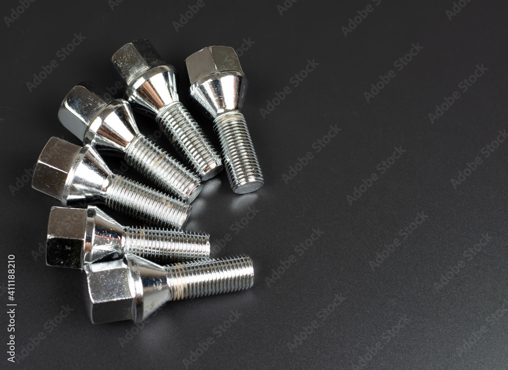 a set of fasteners for repairing wheel attachment to a car a set of fasteners for repairing wheel attachment to a car