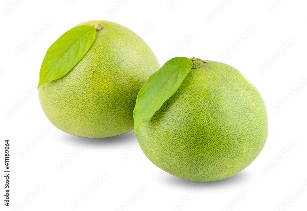 Pomelo citrus fruit with leaves isolated on white background.