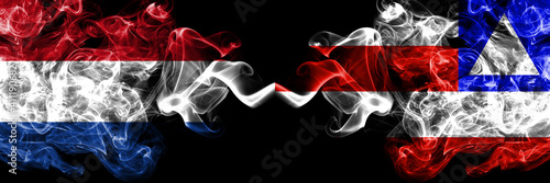 Netherlands vs Bahia  Brazil smoky mystic flags placed side by side. Thick colored silky abstract smoke flags.