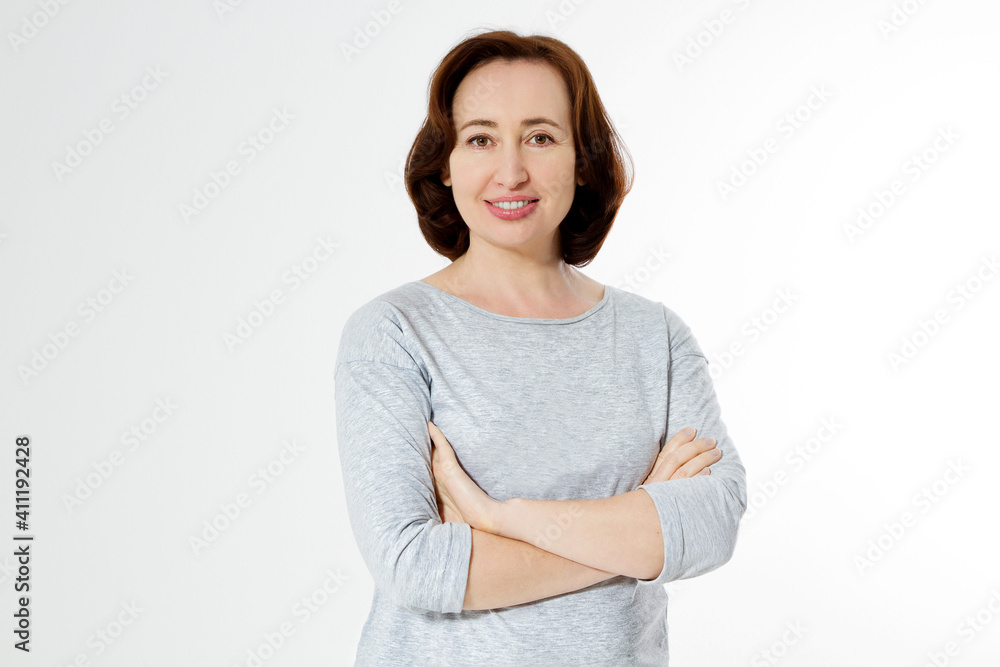 Middle aged woman healthy and happy lifestyle after menopause. Beautiful  close up portrait mid age brunette woman. female isolated on white  background with copy space. Menopausal and healthcare. Photos