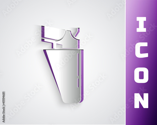 Paper cut Revolver gun in holster icon isolated on grey background. Paper art style. Vector.