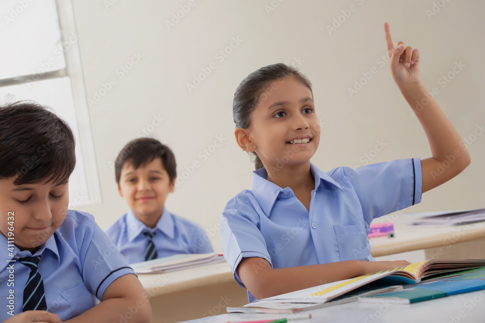 school girl asking for a doubt in class school girl asking for a doubt in class