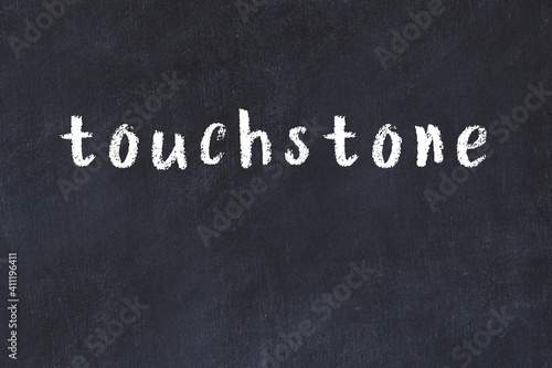 College chalk desk with the word touchstone written on in