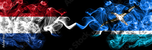 Netherlands vs United States of America, America, US, USA, American, Midway Islands smoky mystic flags placed side by side. Thick colored silky abstract smoke flags.