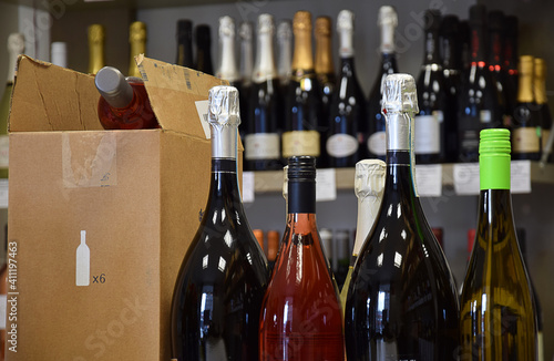 The wine is put in a box and ready for home delivery
     Wine bottles in wine store and ready for home delivery
