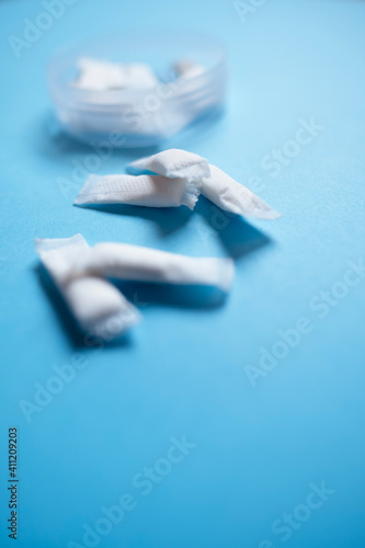 Wallpaper Mural White portion Snus in a Box on a blue background
 Torontodigital.ca