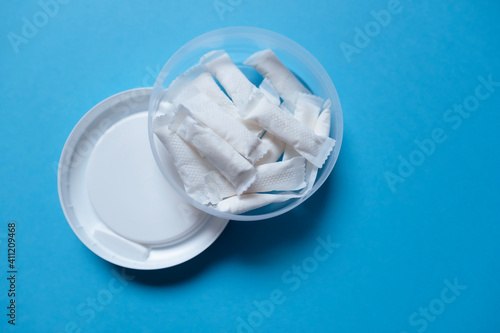 Wallpaper Mural White portion Snus in a Box on a blue background Torontodigital.ca