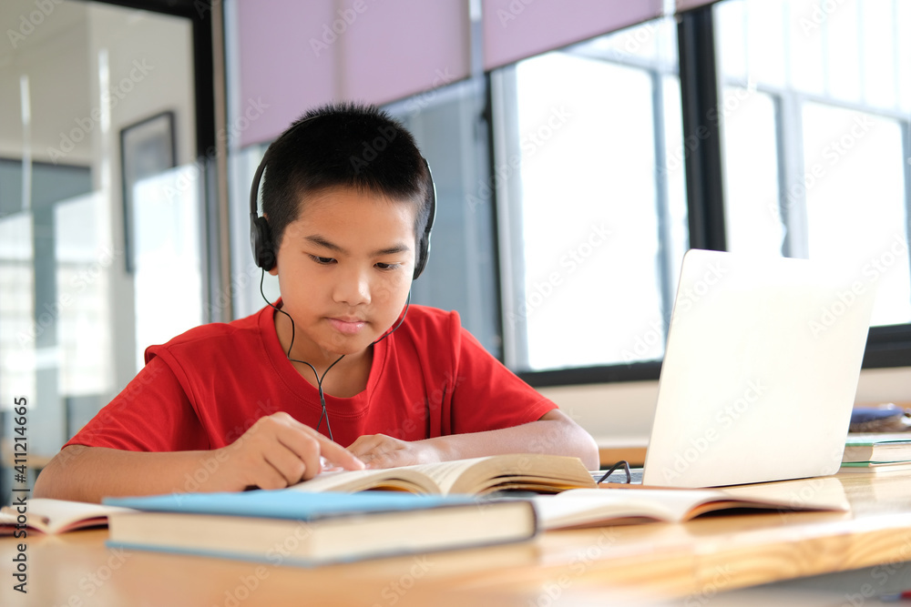 boy student studying learning lesson online. remote meeting distance education at home