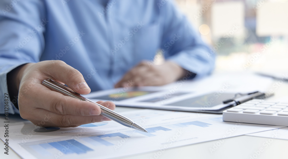Financial businessman analyze the graph of the company's performance to create profits and growth, Market research reports and income statistics, Financial and Accounting concept. Financial businessman analyze the graph of the company's performance to create profits and growth, Market research reports and income statistics, Financial and Accounting concept.