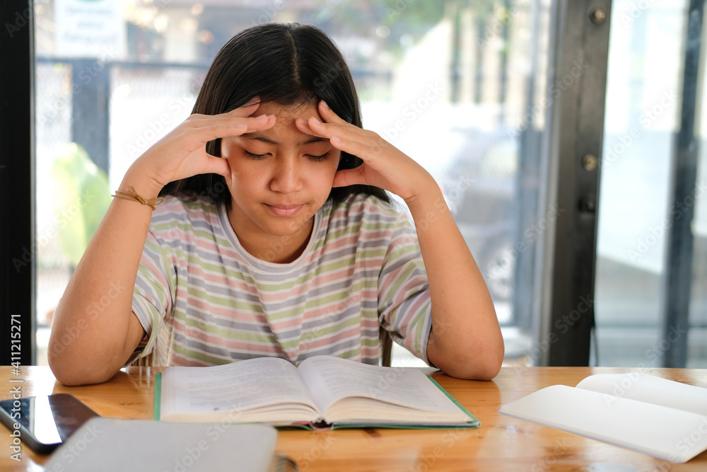 girl student studying hard feeling stressed tired exhausted bored. children education girl student studying hard feeling stressed tired exhausted bored. children education