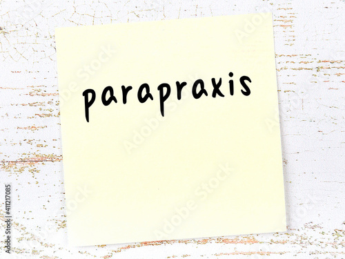 Yellow sheet of paper with word parapraxis. Reminder concept photo