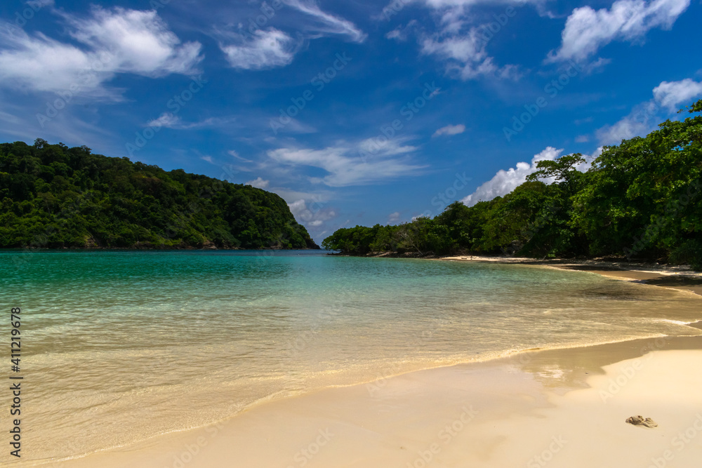 A young tourist female on the beach of koh Lanta island, Thailand