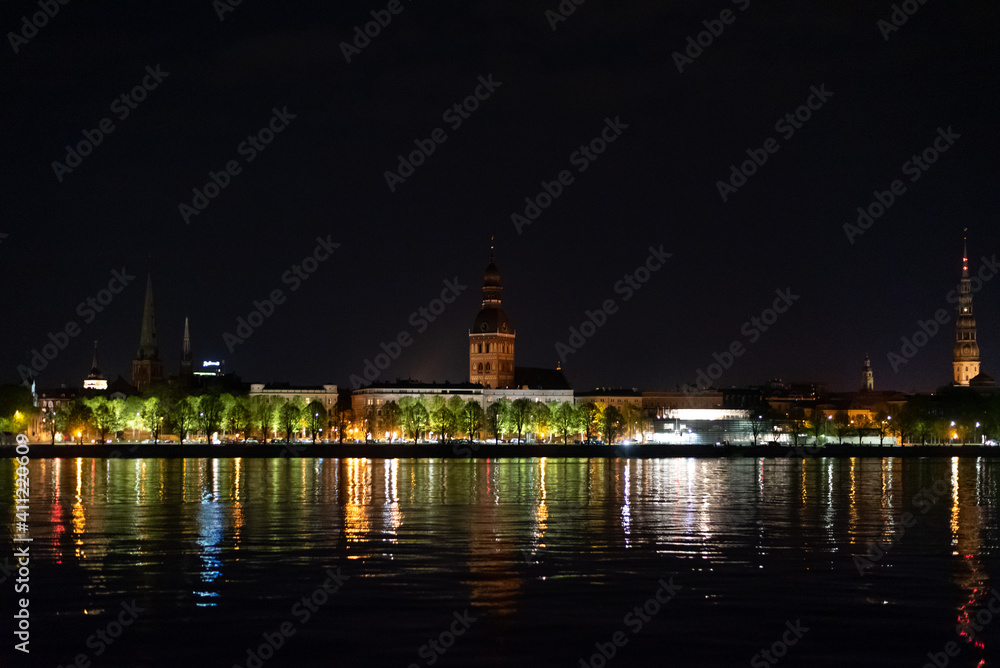 Riga city  panoramic view across Daugava river at night