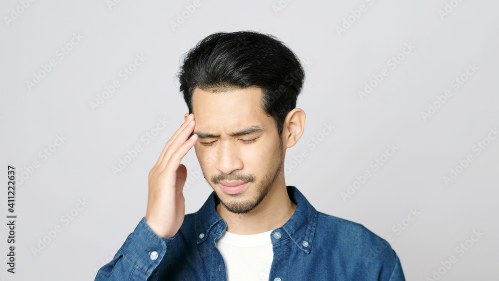 Young asian man disappointed while standing over isolated grey background, Portrait of confused handsome asia guy, People negative gusture expression Young asian man disappointed while standing over isolated grey background, Portrait of confused handsome asia guy, People negative gusture expression