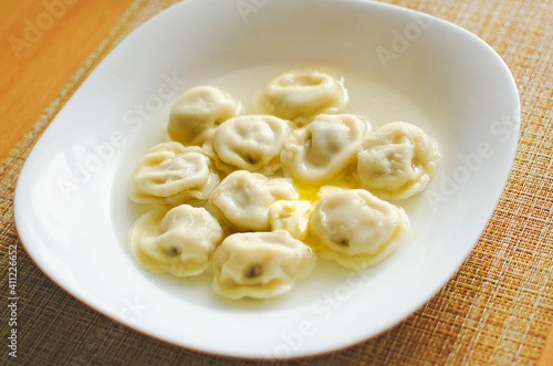 dumplings on a white plate, close-up.