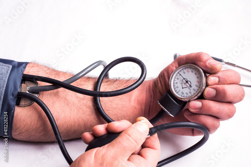 Blood pressure gage in a man  hands