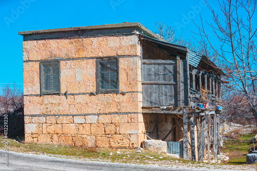 Ruins of abandoned historic Ottoman houses in Uzuncaburc - Mersin, Turkey © muratart