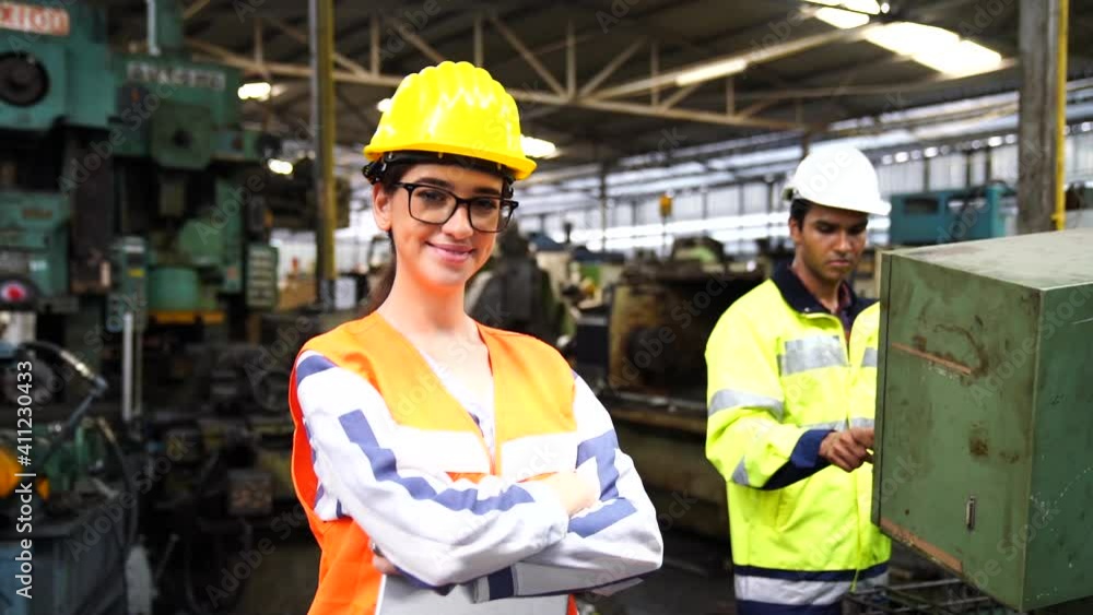 Engineer checking and controlling automatic machine in the industry. Maintenance technicians and engineers are checking the machines in the factory. Engineer checking and controlling automatic machine in the industry. Maintenance technicians and engineers are checking the machines in the factory.