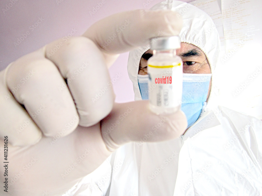 doctor with syringe and pills doctor with syringe and pills