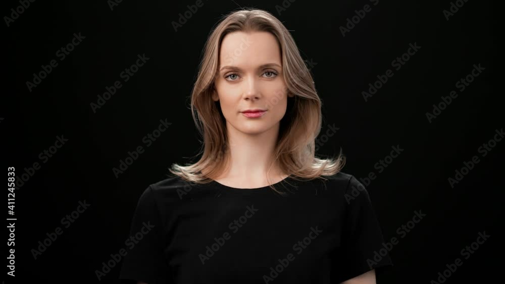 Portrait of blonde lady with fresh young skin posing isolated. Medium close up shot on 4k RED camera Portrait of blonde lady with fresh young skin posing isolated. Medium close up shot on 4k RED camera
