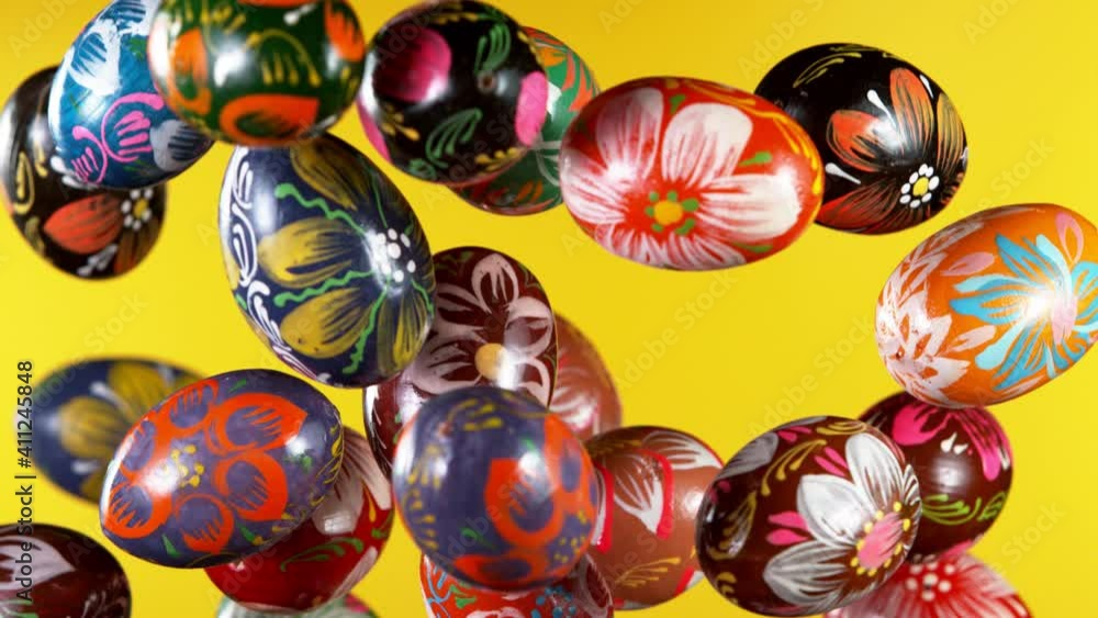 Super slow motion of flying colored easter eggs. Filmed on high speed cinema camera, 1000 fps Super slow motion of flying colored easter eggs. Filmed on high speed cinema camera, 1000 fps