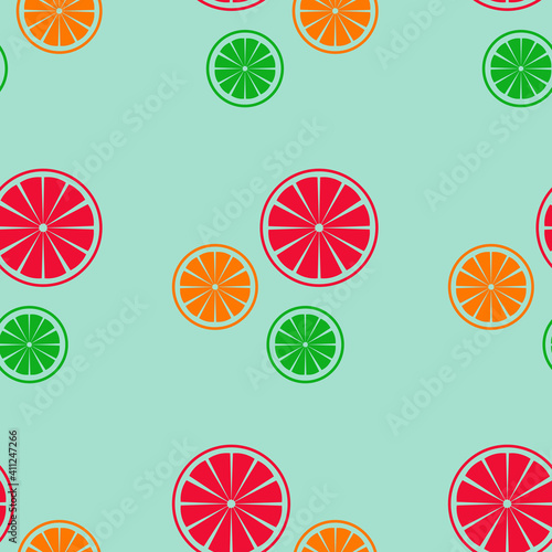 Red, green, orange citruses on a sky-blue background.