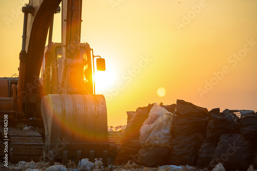 Makro vehicles waiting for landfill land with plastic waste Environmental problems, waste pollution Or household waste photo