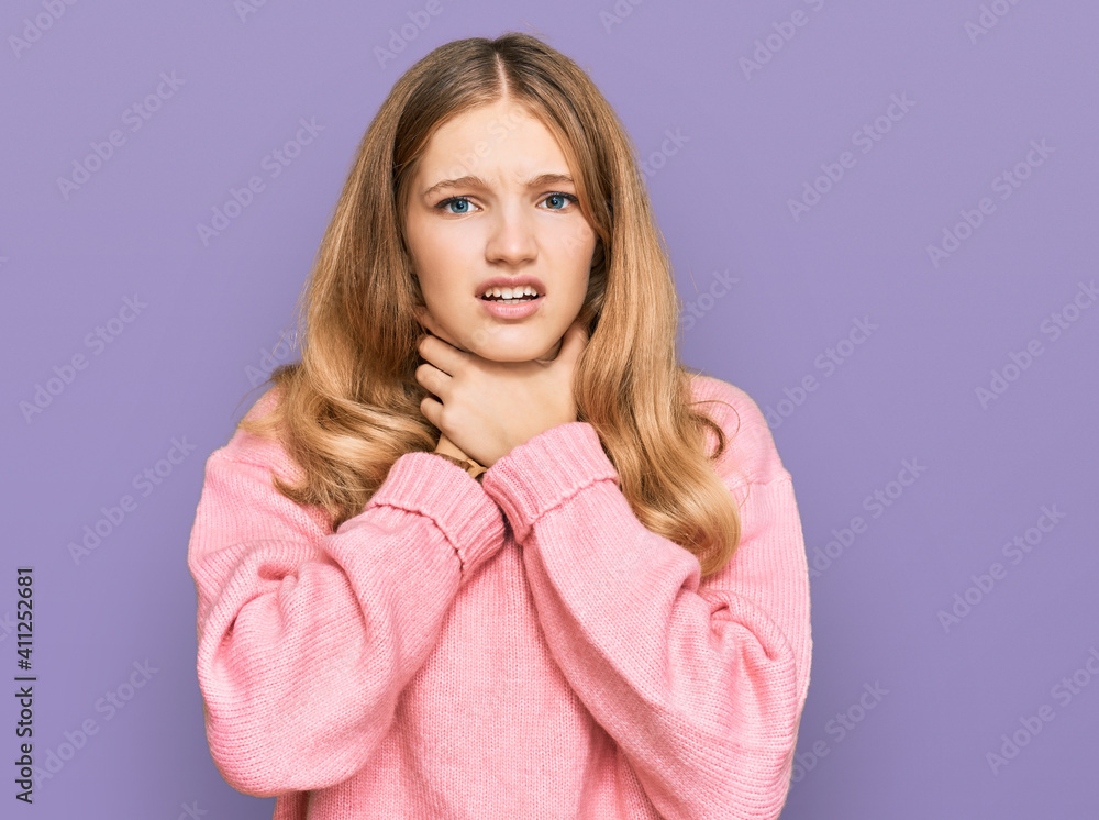 Beautiful young caucasian girl wearing casual winter sweater shouting and suffocate because painful strangle. health problem. asphyxiate and suicide concept. Beautiful young caucasian girl wearing casual winter sweater shouting and suffocate because painful strangle. health problem. asphyxiate and suicide concept.